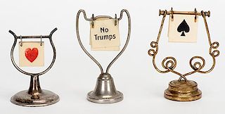 Three Trump Indicators With Hanging Celluloid Flip Cards on Wire Supports. Circa 1930. A few of the flip cards are faded but overall very good.
