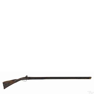 Full stock flintlock fowler, approximately .65 caliber, with a maple stock, a brass buttplate