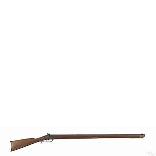 Full stock percussion rifle, approximately .52 caliber, with a cherry stock