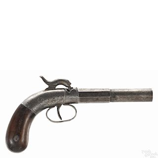 Bacon & Co. percussion boot pistol, approximately .35 caliber, with a foliate engraved frame