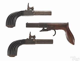 Three pistols, to include two matched Belgian screw barrel single shot pistols