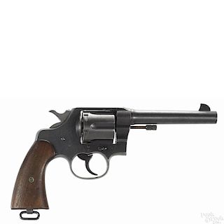 Colt US Army model 1917 six-shot revolver, .45 ACP caliber, with a blued finish and walnut grips
