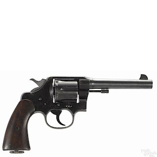 Colt US Army model 1917 six-shot revolver, .45 ACP caliber, with a blued finish and walnut grips