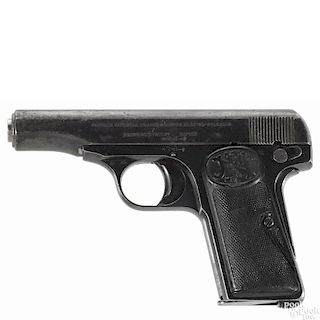 Two semi-automatic pistols, 7.65 caliber, the first a FN model 1910 with a blued frame and slide