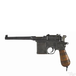 Broomhandle Mauser model 1896 Commercial pistol, 7.63 mm, with a blued finish and walnut grips