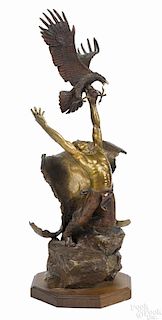 Wally Shoop (American 20th c.), bronze figure of a Native American Indian with an eagle, signed
