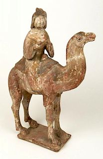 Chinese Tang Dynasty  (618–906) Pottery Camel with Female Rider and traces of pigment.