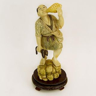 Mid 20th Century Japanese Carved Ivory with wood base, Man with Sea Shell.