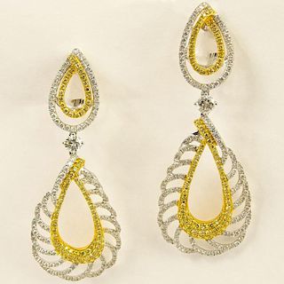 Lady's Round Brilliant Cut Yellow and White Diamond and 18 Karat Gold Chandelier Earrings.