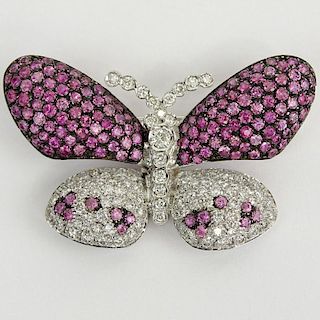 18 Karat White Gold, Round Cut Diamond and Pink Sapphire Butterfly Brooch. Diamonds G-H color, VS-SI clarity. Signed 750. Very good condition. Measure