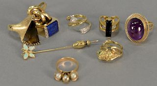 14K gold lot of eight rings and one stickpin, 58.5 grams total weight.