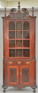 Centennial mahogany Chippendale style corner cabinet in two parts.