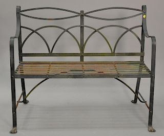 Iron outdoor bench with paw feet. wd. 44"
