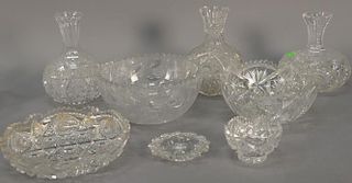 Eight pieces of cut glass including three vases, three large bowls, and a small dish with underplate