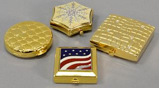 Four Estee Lauder Lucidity compacts, Snow Fling, America the Beautiful, and two others