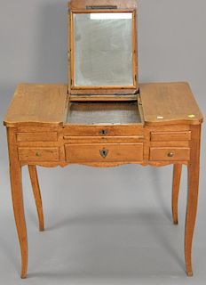 French Fruitwood poudreuse with flip top mirror pull out shelf over three drawers, ht. 28", wd. 28", dp. 17".