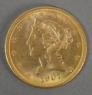 1907 $5. Liberty gold coin.