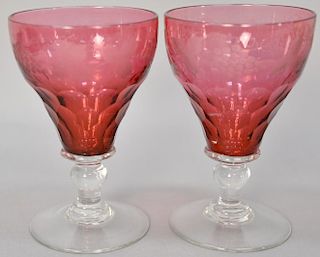 Set of ten cranberry stemmed goblets with etched grape designs, ht