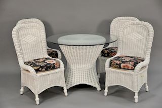 Five piece wicker set with four chairs and round glass top table. ht. 30", dia. 42"