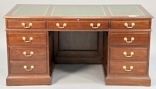 Stickley cherry desk with tooled leather top. ht. 31", top: 32" x 62"