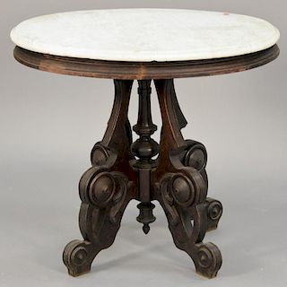 Oval Victorian marble top table. ht. 28", top: 32" x 24"