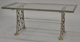 Steel glass top coffee table with brass feet. ht. 16", top: 18" x 36"