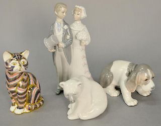 Four porcelain figures to include Royal Crown Derby Imari pattern cat, Lladro polar bear, dog, and bride with groom. ht. 3" to 7 1/2"