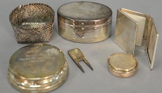 Five sterling pieces including three Tiffany & Co. pieces, Cartier sterling three part frame, and a small pill box marked Pallarols,...