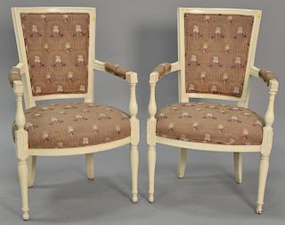 Pair of French style white painted armchairs.