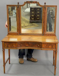 French style walnut vanity with three part mirror.