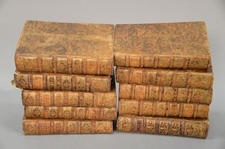 Ten volumes of Histoire De France Louis XIV 1718 with leather bindings.