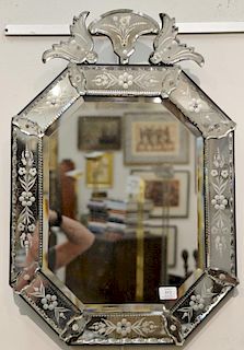 Venetian mirror with mirrored frame
