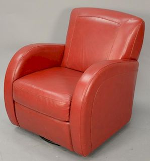 Red leather swivel chair.
