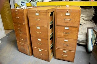 Set of three Globe oak file cabinets, ht. 52" (some chips).