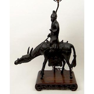 Early 20th Century Chinese Bronze "Scholar Riding a Donkey" Bearded Figure Wearing a Simple long Robe Holding a Scroll.