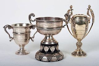 Three miniature silver trophy cups