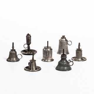 Seven Small Pewter Chamber Lamps