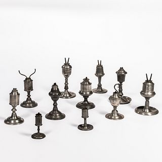 Eleven Pewter Whale Lamps