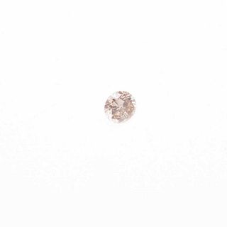 Un diamante corte brillate 0.32ct color champagne.