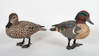 Two carved and painted wood duck figures