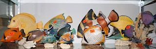 Twelve  carved and painted wood exotic fish
