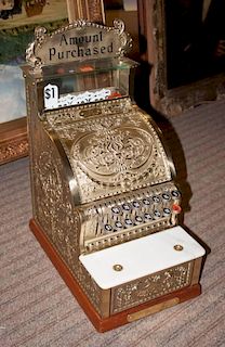 Victorian style brass and marble cash register