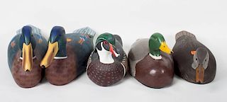 Five carved and painted wood duck figures
