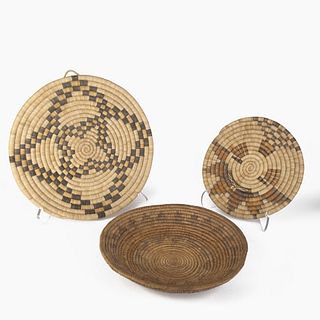 Dine [Navajo] + Hopi, Group of Three Basket Plaques: Wedding Basket, ca. 1930s + Pictorial Plaque Basket with Sun Face Katsina, ca. 1950 + Coiled Plaq