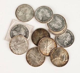 Eleven American Eagle silver bullion coins