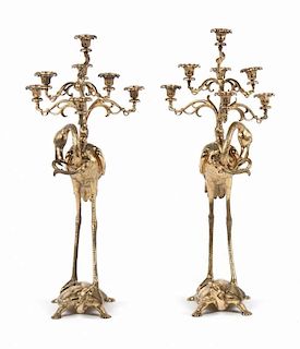 Oriental influenced brass figural candelabra