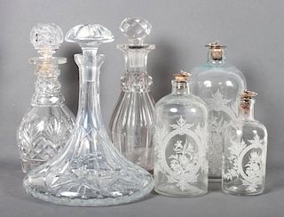 Six Continental glass dresser bottles & decanters