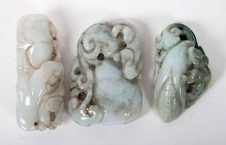 Three Chinese carved pendants