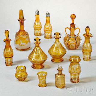 Twelve Pieces of Amber Etched Bohemian Glass Tableware