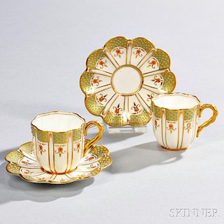 Pair of Jeweled Coalport Porcelain Cups and Saucers